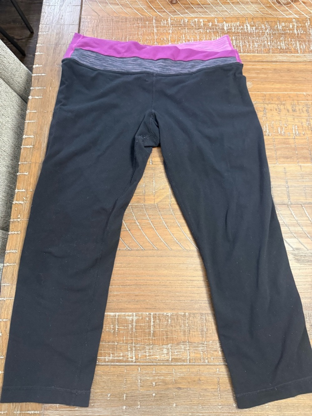 3/$15 Woman’s Black Capri Leggings with Purple Waistband